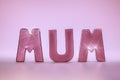 Mum word in glamtastic pink rose gold letters Royalty Free Stock Photo